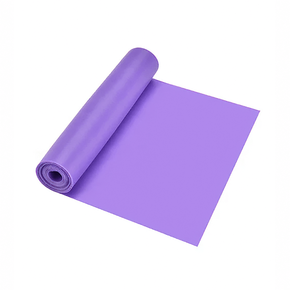 Purple yoga mat rolled out for fitness and pilates workouts, ideal for home or gym use.